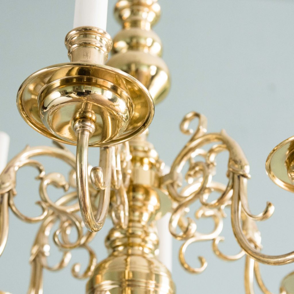 Two brass Flemish style chandeliers,-103929