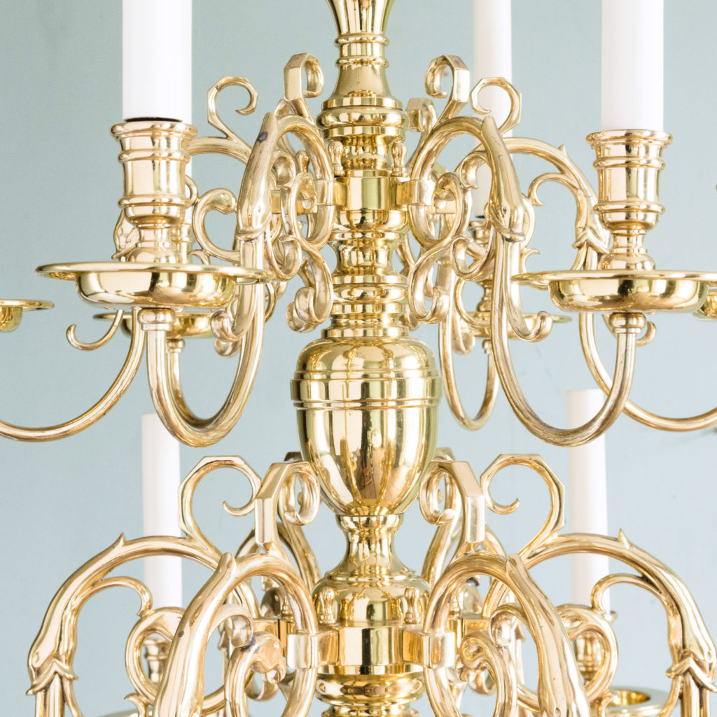 Two brass Flemish style chandeliers,-103928