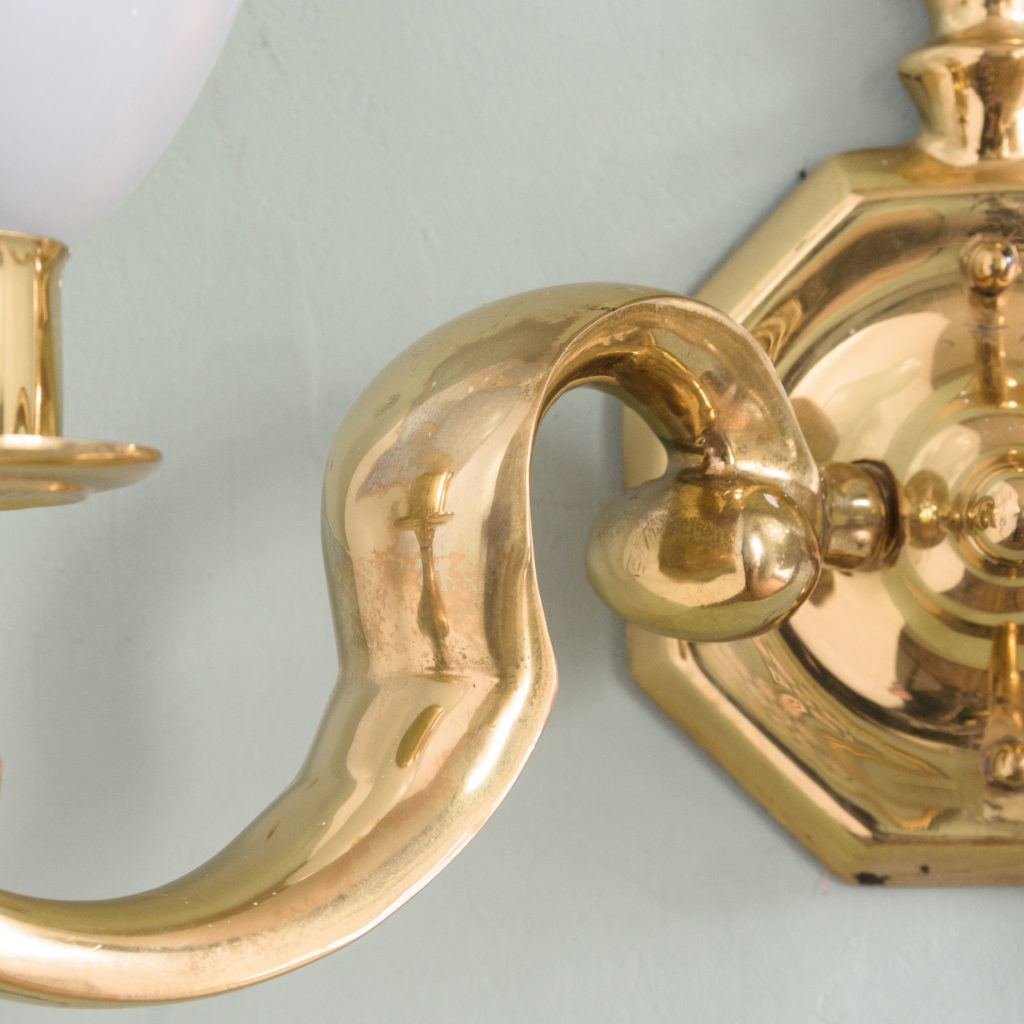 Scrolled brass wall lights,-105130