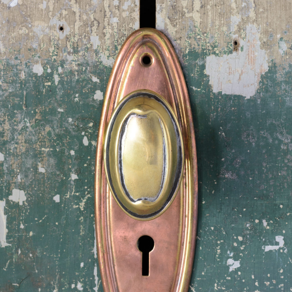 Pair of 1920s oval brass door handles,-105347