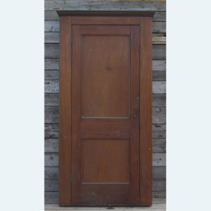 An English mahogany two-panelled cupboard door,-0