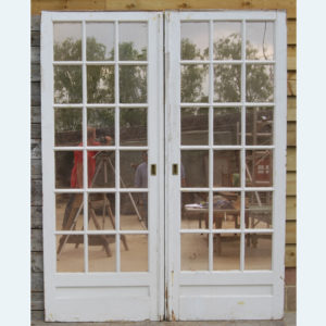 A pair of English mirror-glazed pine pocket doors,-0