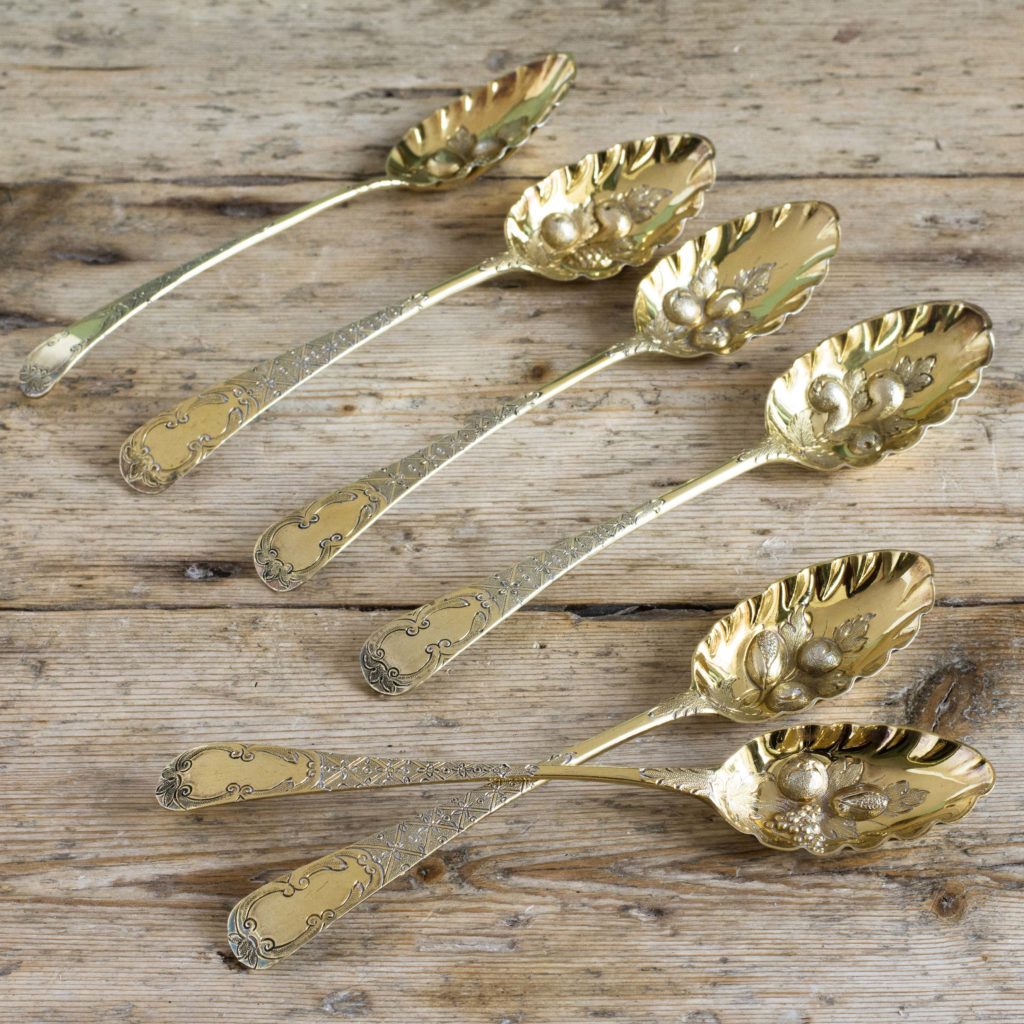 Set of six silver gilt fruit spoons,-106127
