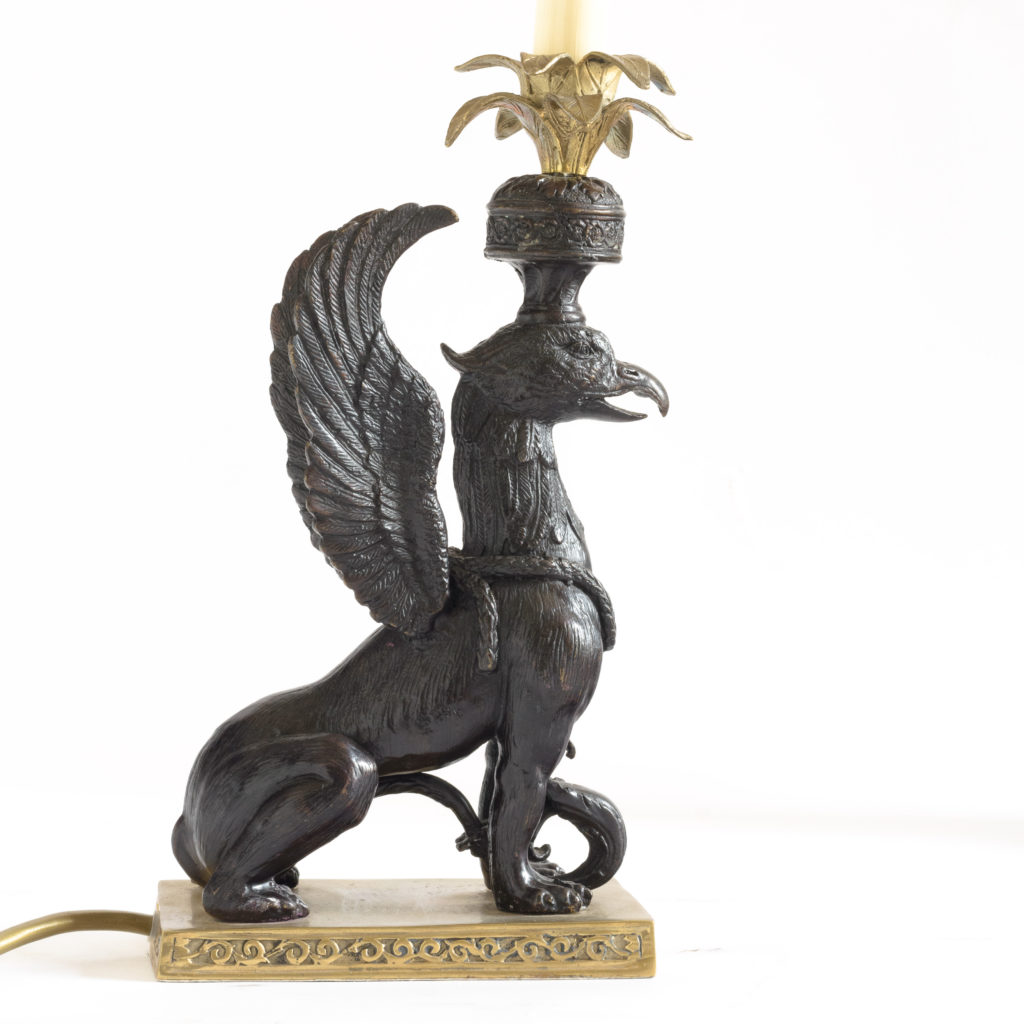 A pair of winged griffin bronze and brass table lamps,-106345