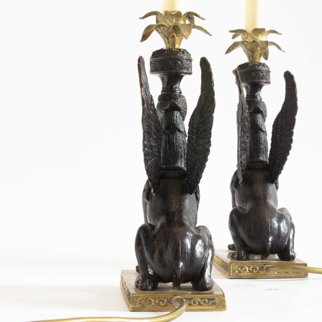 A pair of winged griffin bronze and brass table lamps,-106352