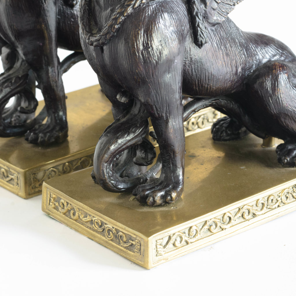 A pair of winged griffin bronze and brass table lamps,-106347