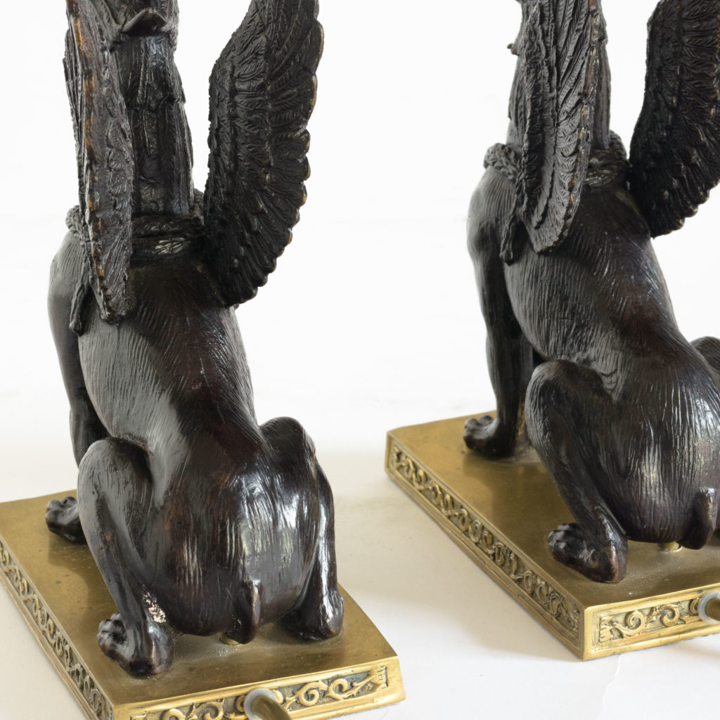 A pair of winged griffin bronze and brass table lamps,-106354