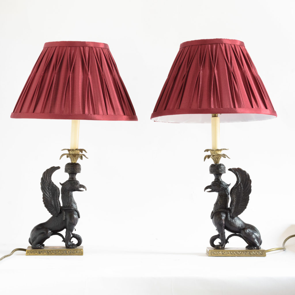 A pair of winged griffin bronze and brass table lamps,-106349