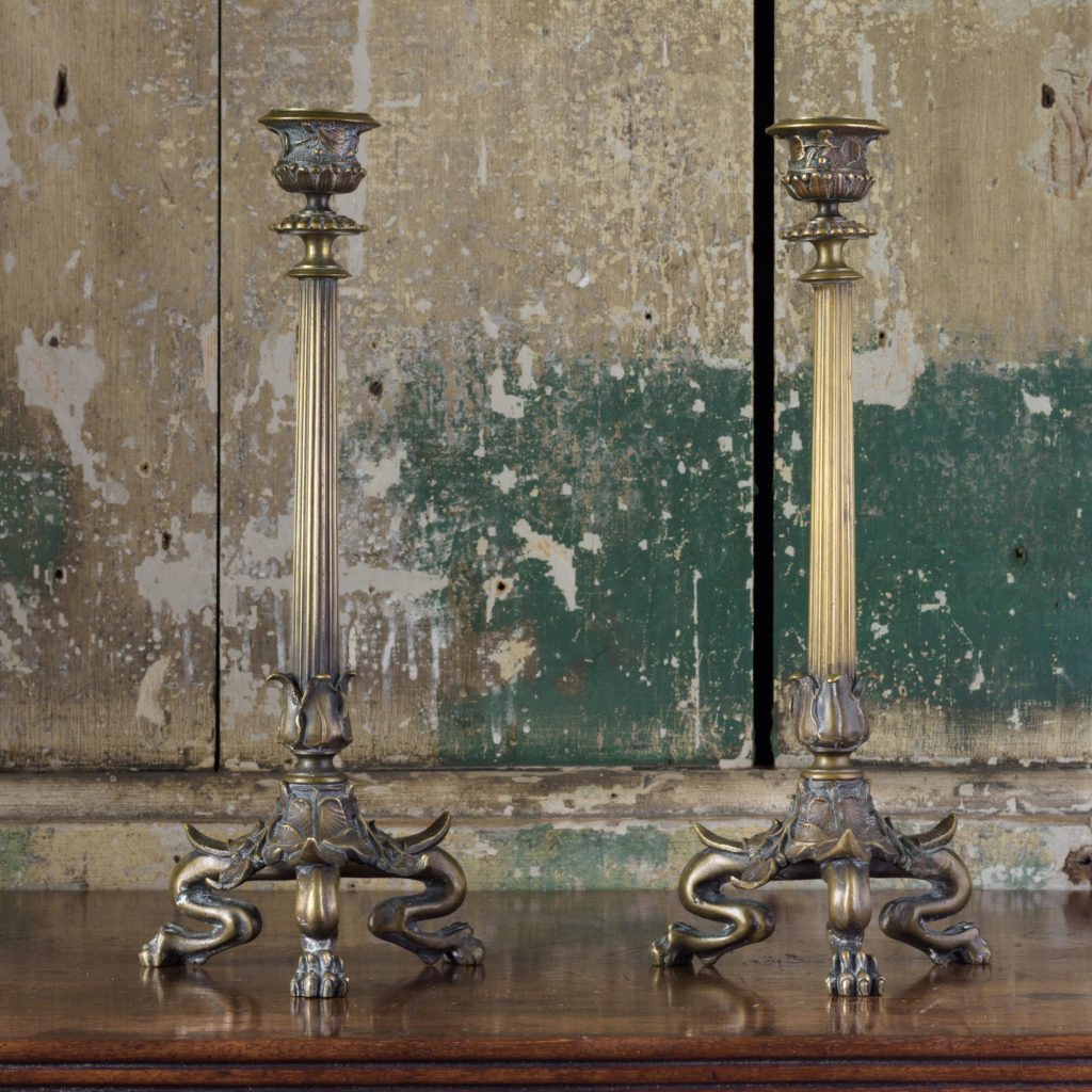 Pair of nineteenth century French brass candlesticks,-0