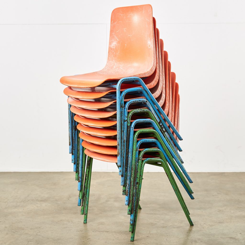 Distressed orange school chairs,-107468