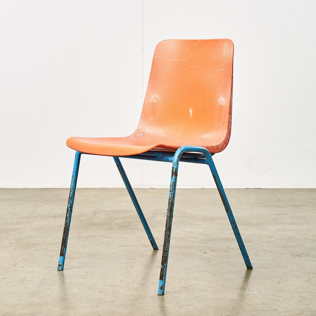 Distressed orange school chairs,-0