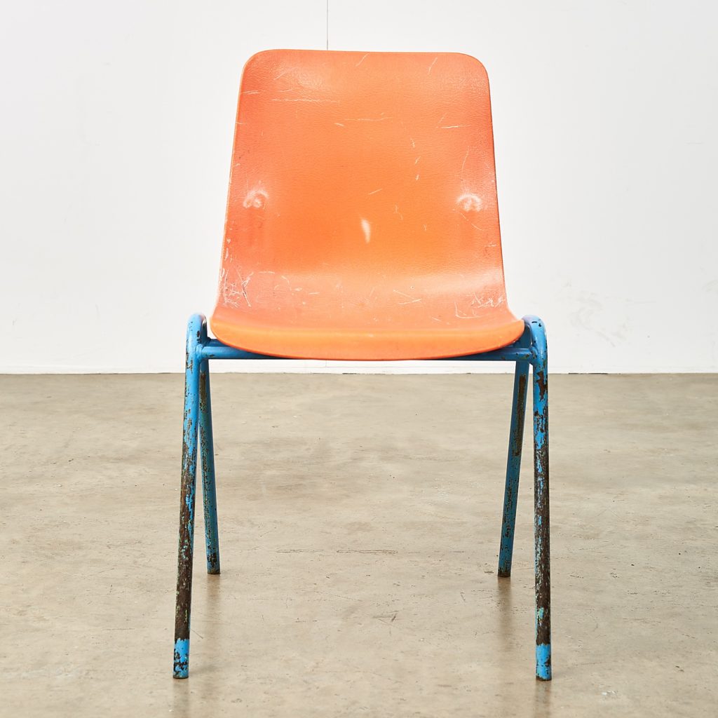 Distressed orange school chairs,-107475