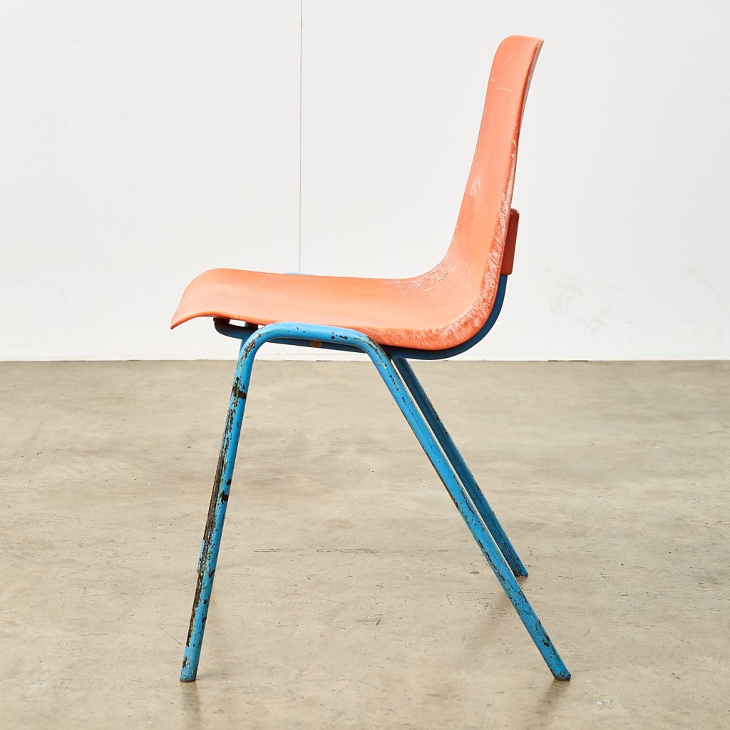 Distressed orange school chairs,-107474