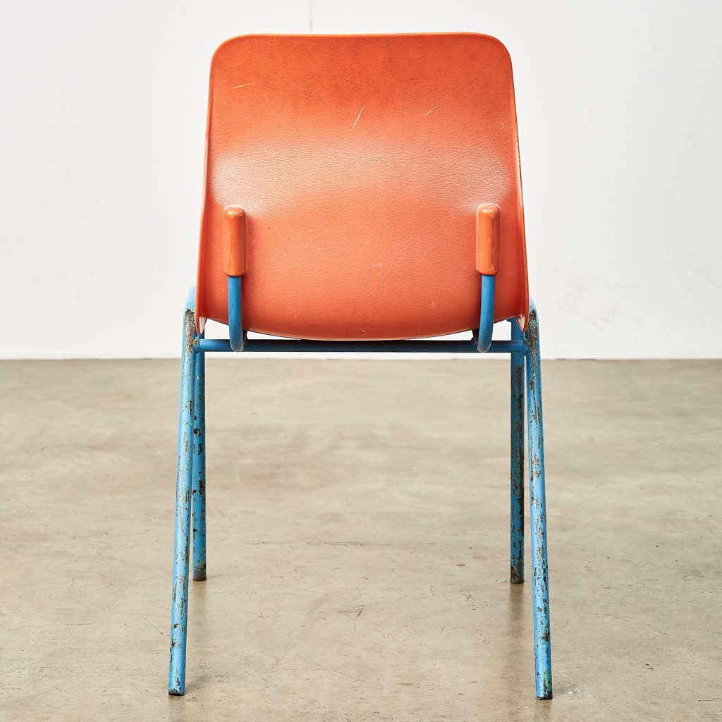 Distressed orange school chairs,-107473