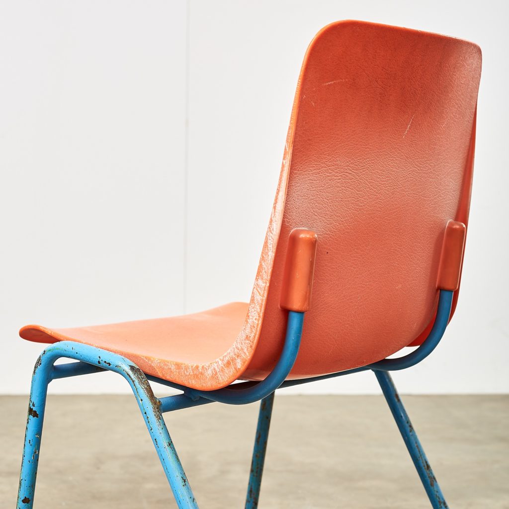 Distressed orange school chairs,-107469