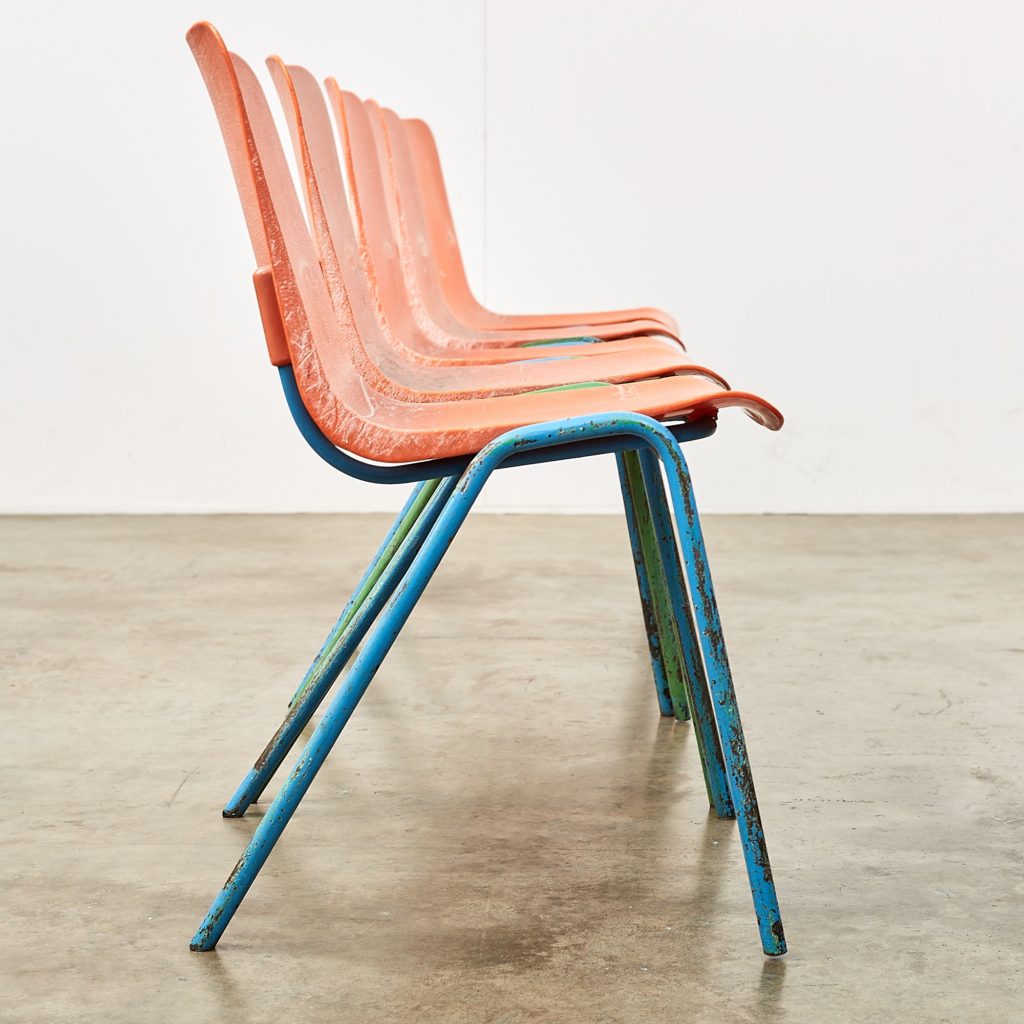 Distressed orange school chairs,-107467