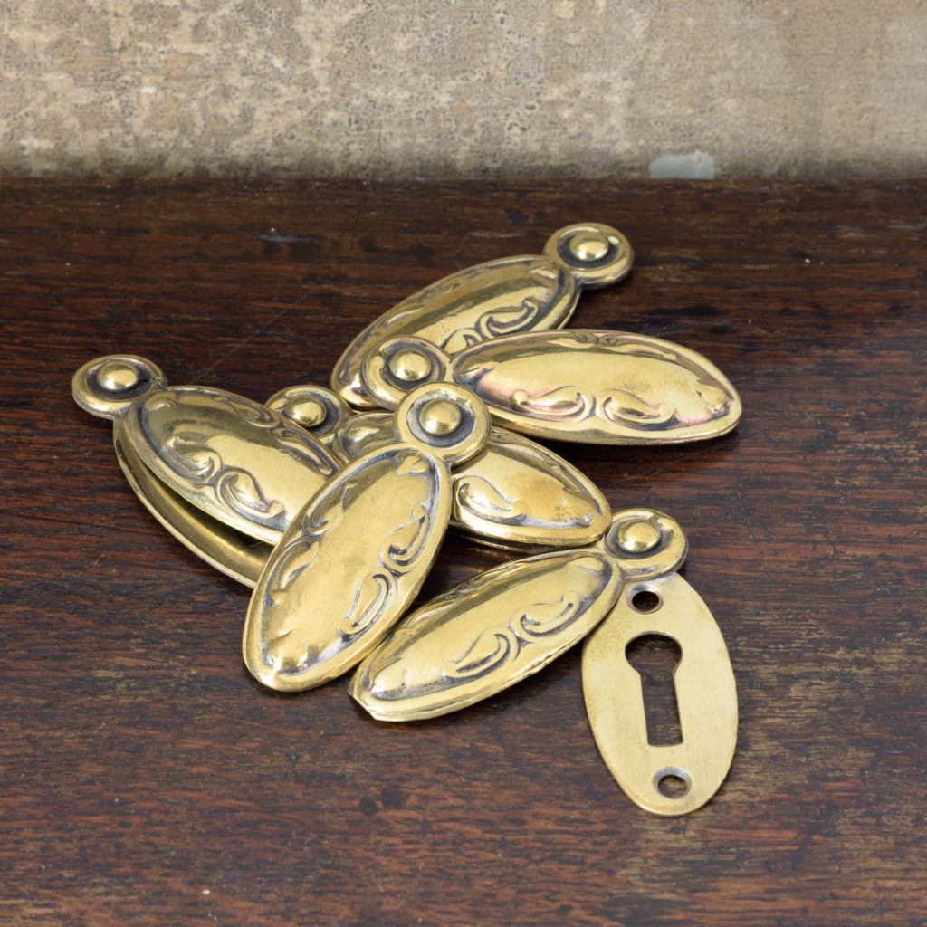 Pressed brass escutcheons,-107751