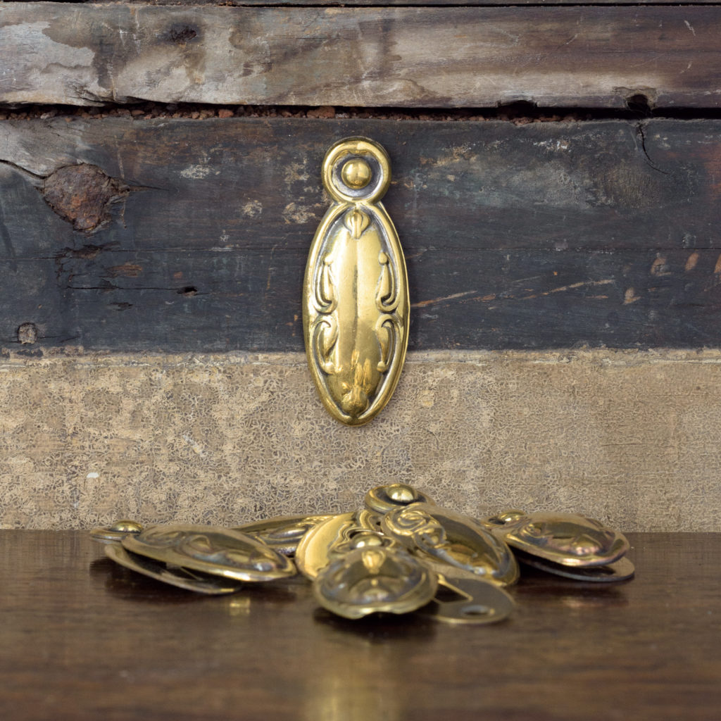 Pressed brass escutcheons,-0