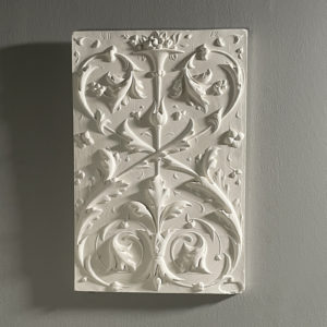 plaster relief plaque