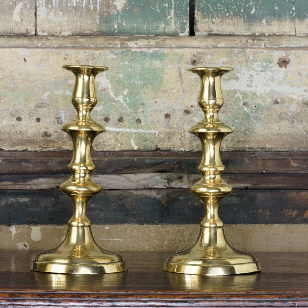 Pair of nineteenth century brass candlesticks,-0