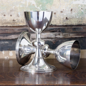 Pair of late nineteenth century silver communion chalices,-0