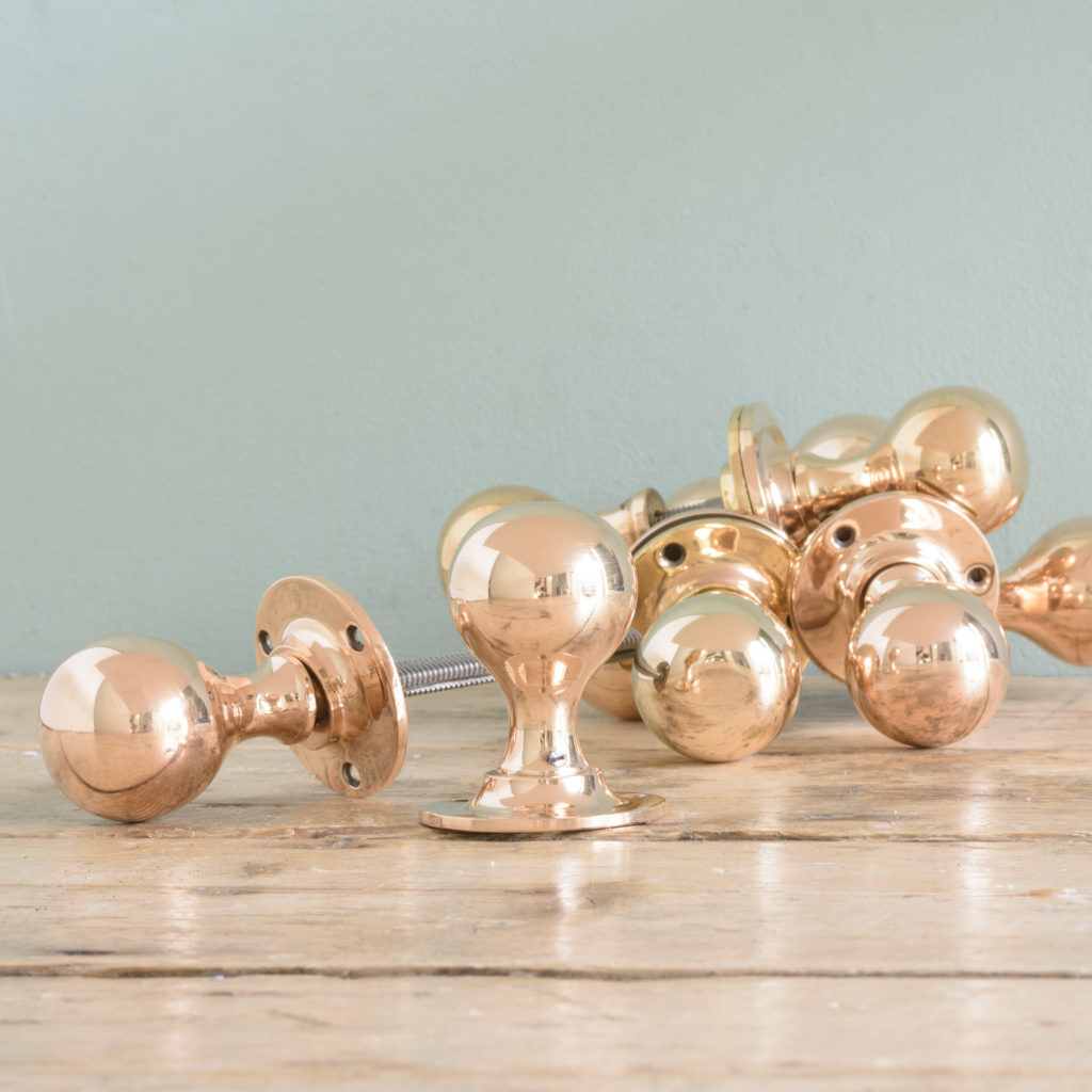 Late Victorian rose brass door knobs,-0