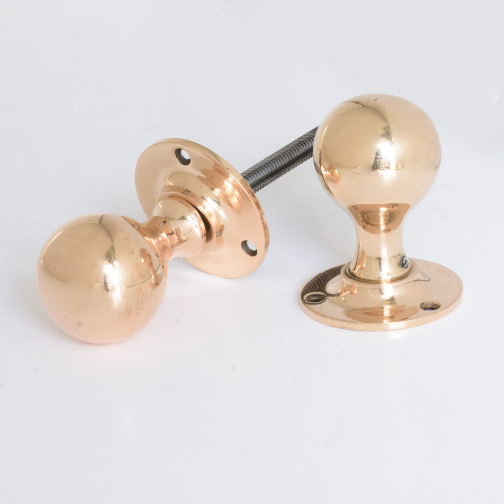 Late Victorian rose brass door knobs,-109846