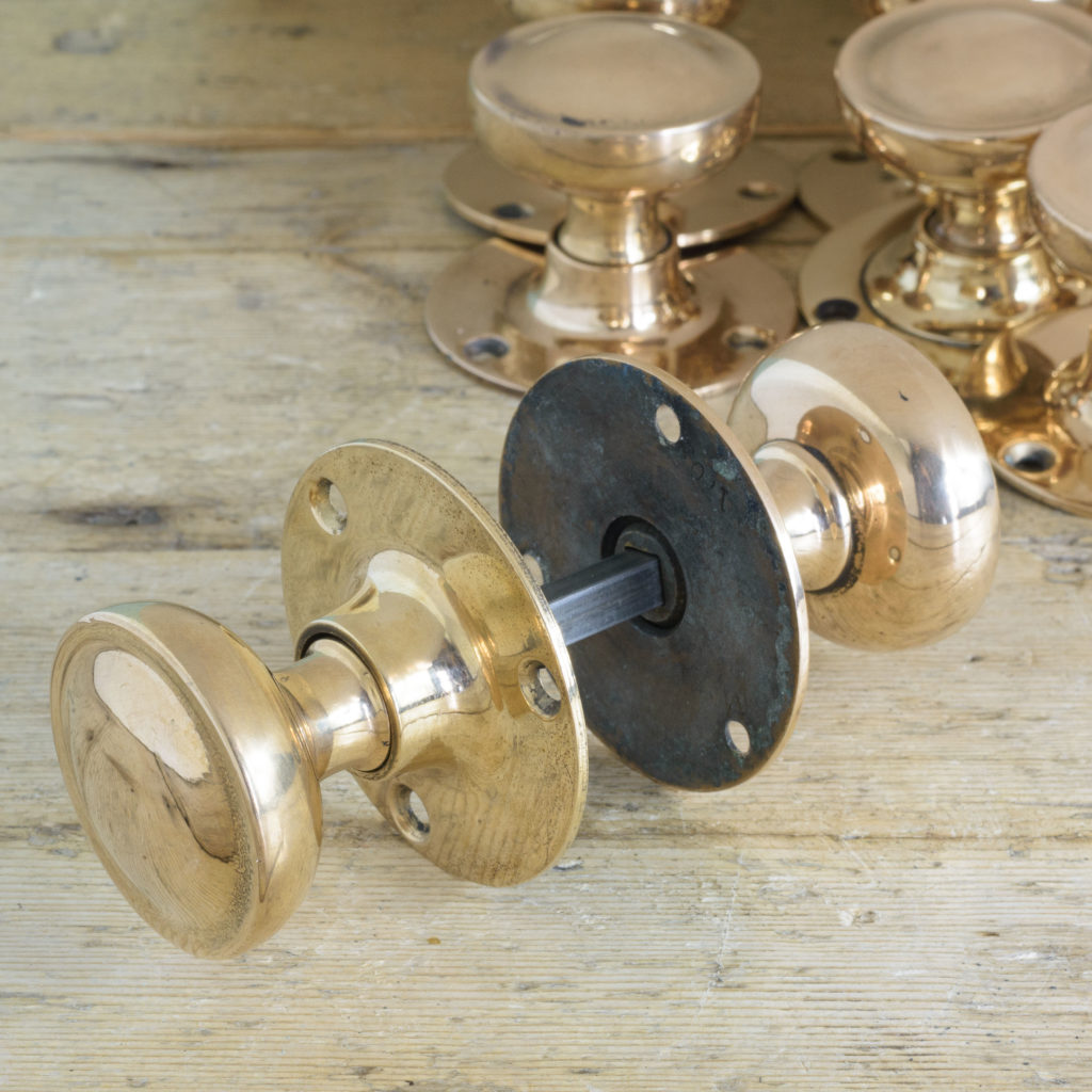 Early twentieth century rose brass door knobs,-110581