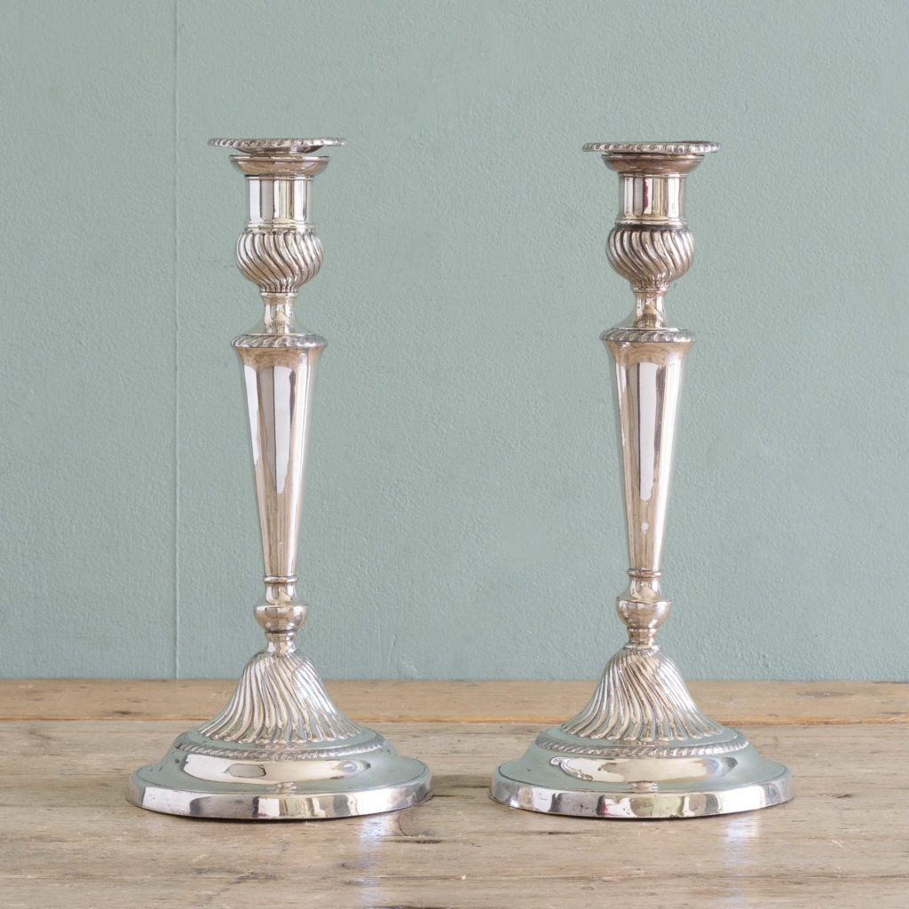 Pair of Sheffield plate George III style candlesticks,-0