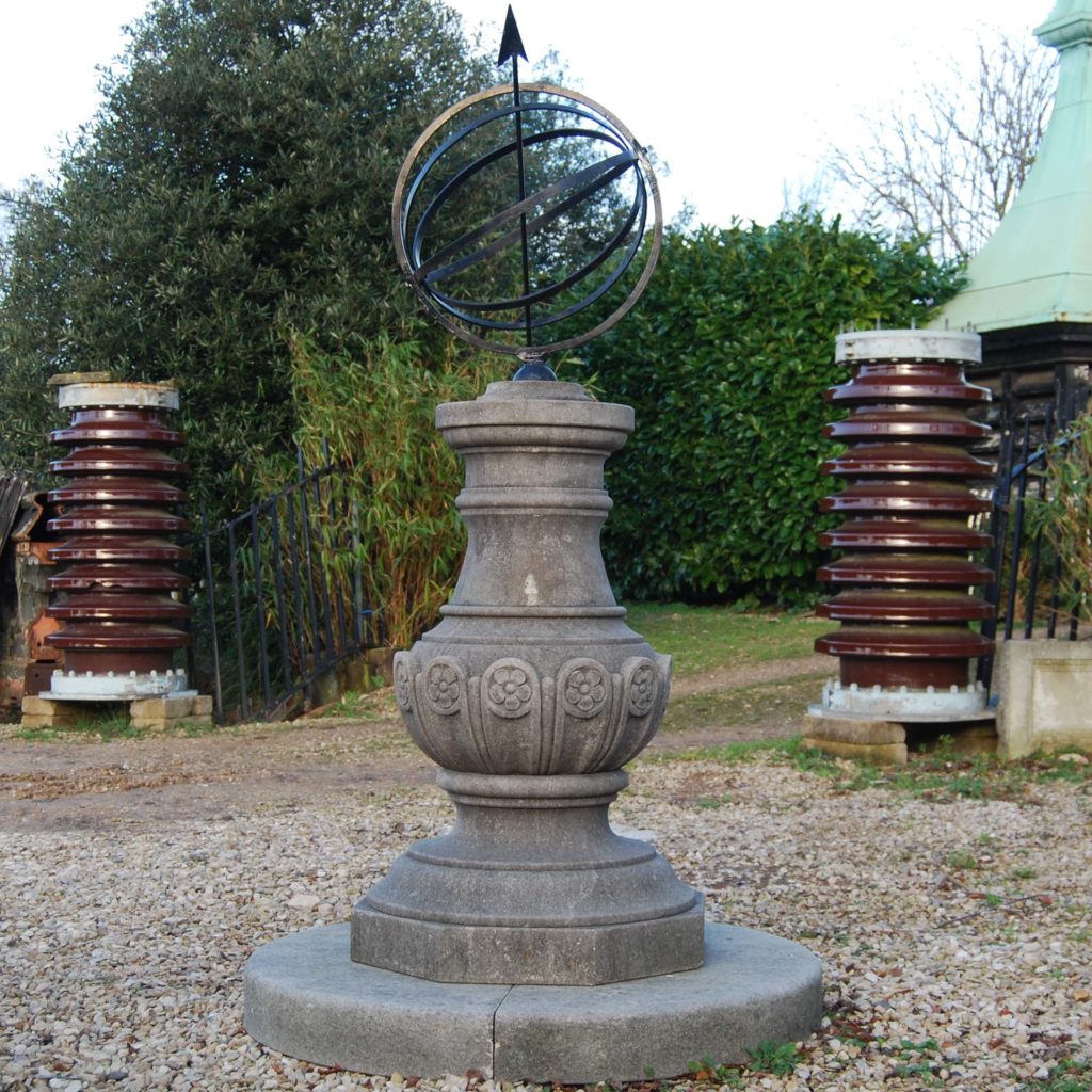 A carved limestone sundial pedestal and steel armillary sphere-0