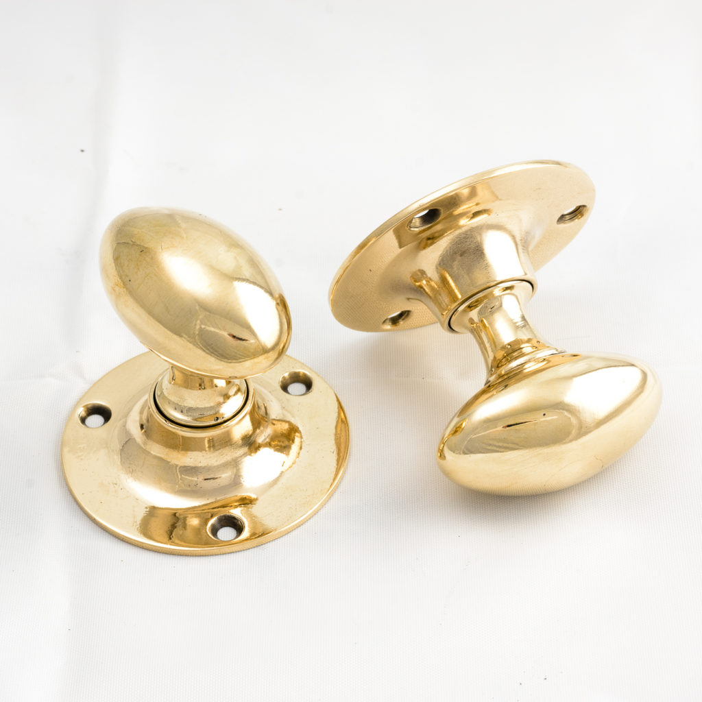 Early twentieth century oval door knobs,-112433