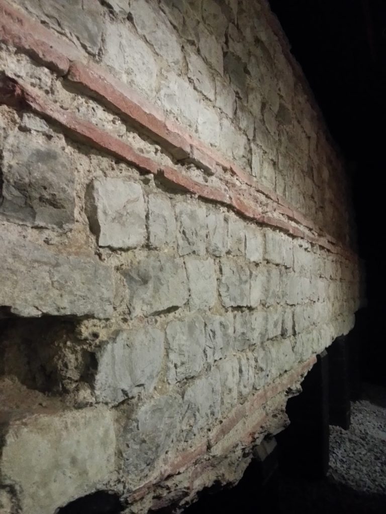 Stretch of Roman wall in the basement of the building