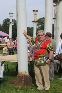 Sir William McAlpine with his "Iron henge" - his circle of enormous columns salvaged from St. Pancras Station.