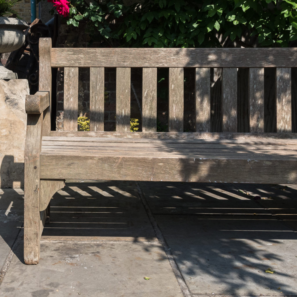 A weathered teak bench,-115993