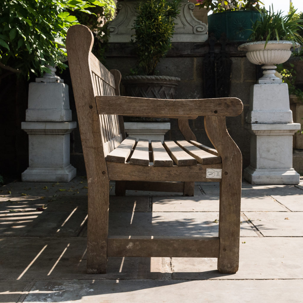 A weathered teak bench,-115988