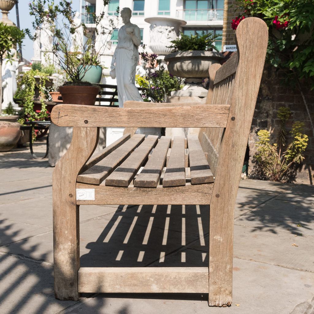 A weathered teak bench,-115986