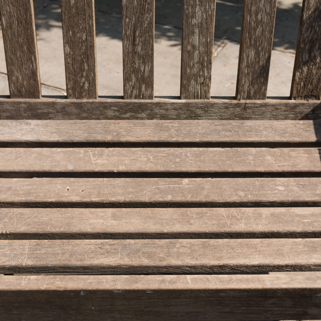 A weathered teak bench,-115989