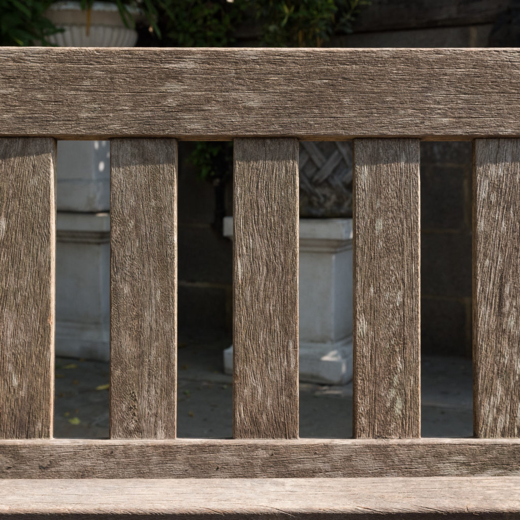 A weathered teak bench,-115990