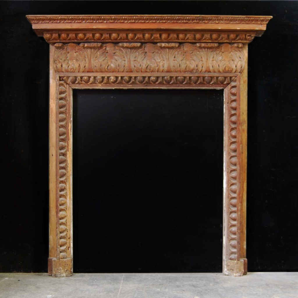 A carved pine chimneypiece in the Georgian taste-0