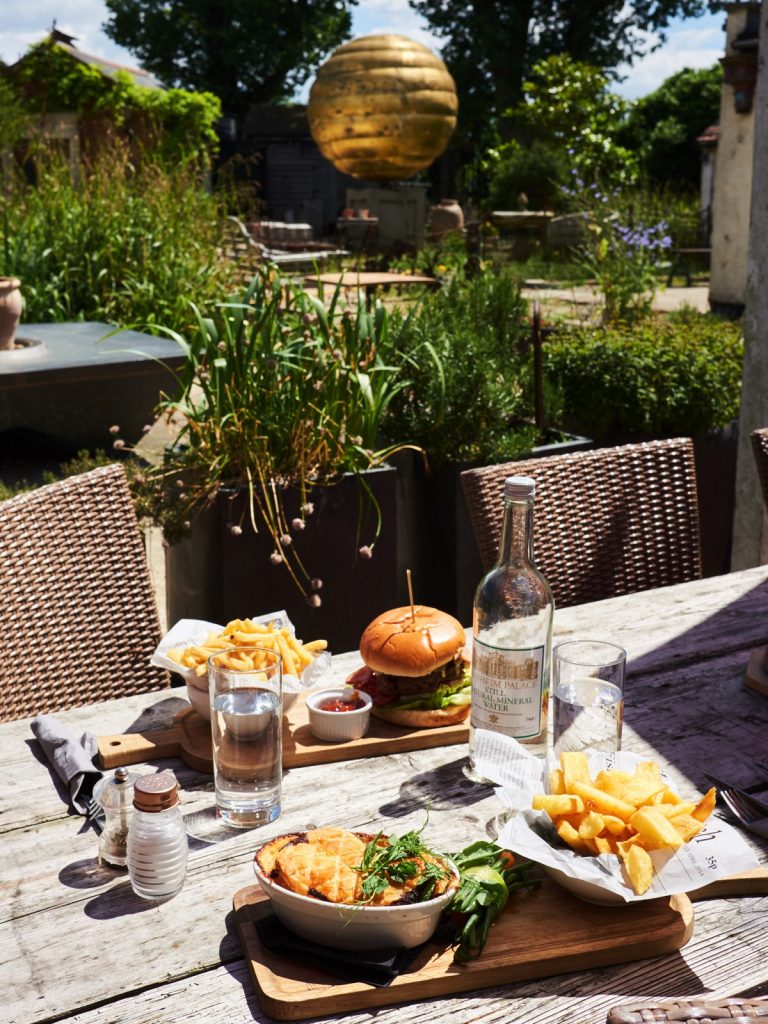 Burger and Pie on the Patio Terrace at The Three Pigeons Inn