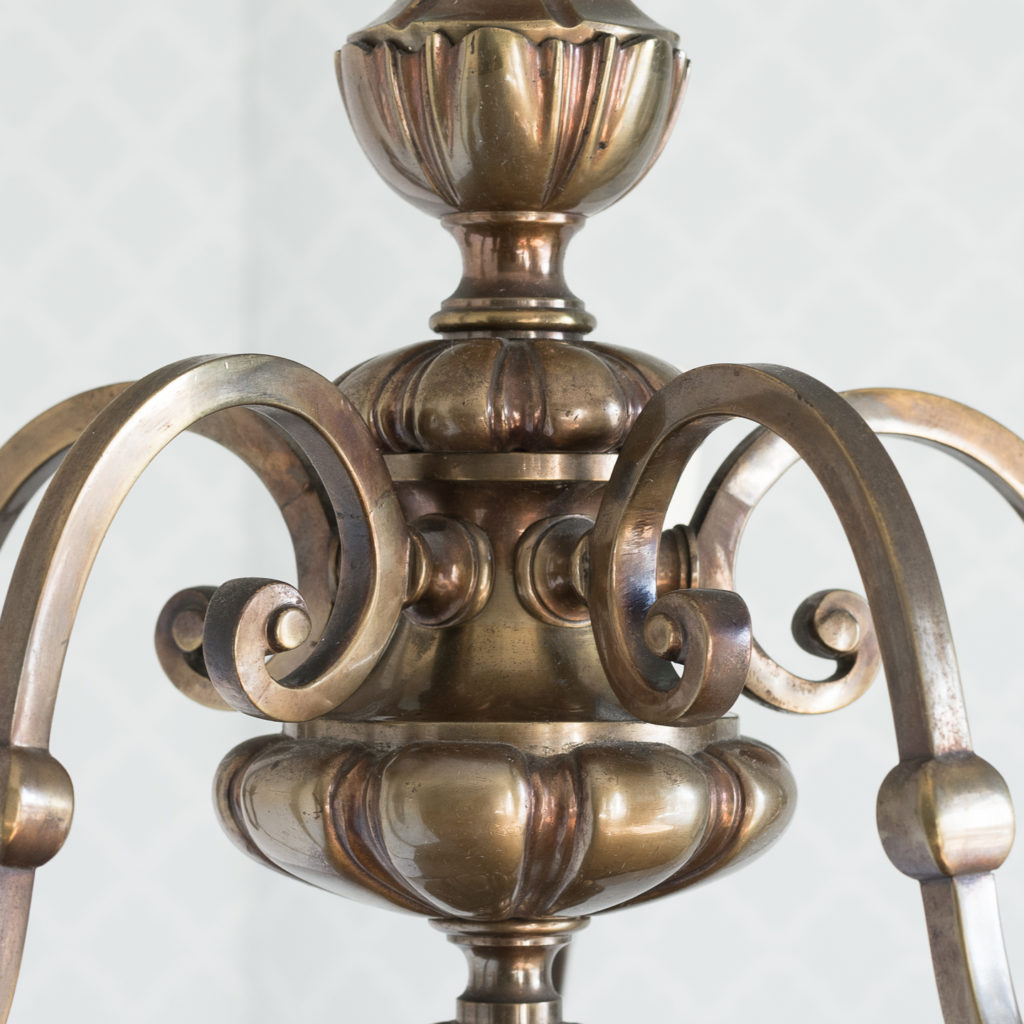 Three bronzed five light chandeliers, -117432