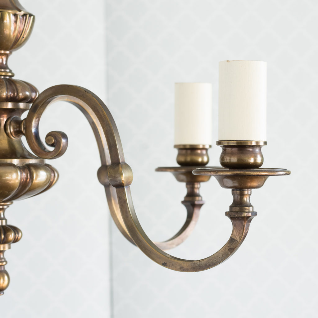 Three bronzed five light chandeliers, -117434