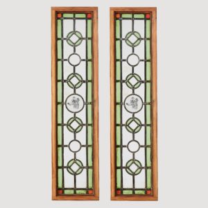 A pair of stained glass panels,-0