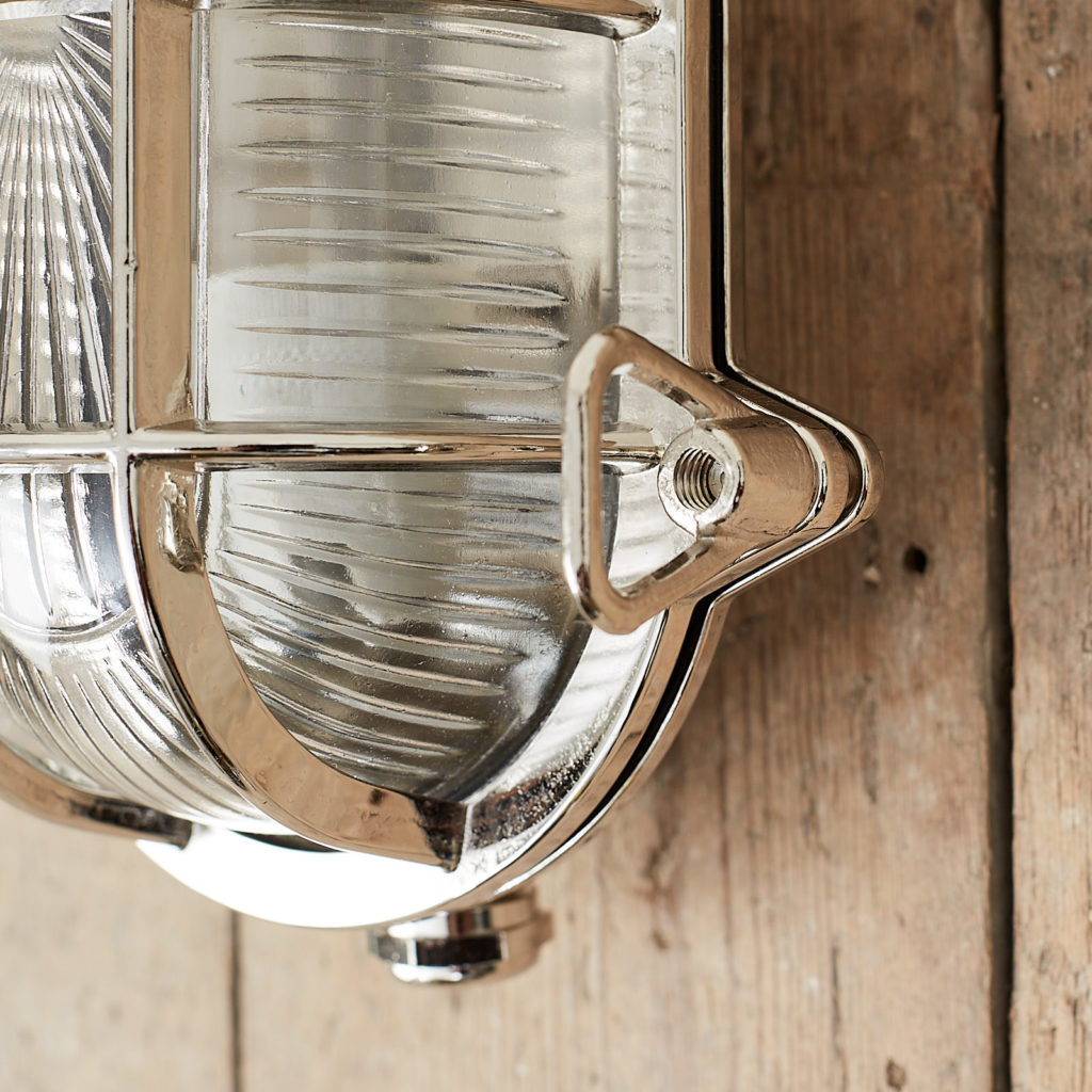 A polished nickel bulkhead light,-121562