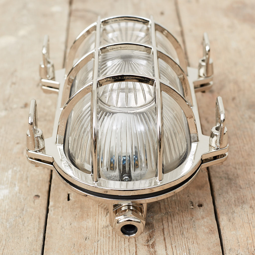 A polished nickel bulkhead light,-121567