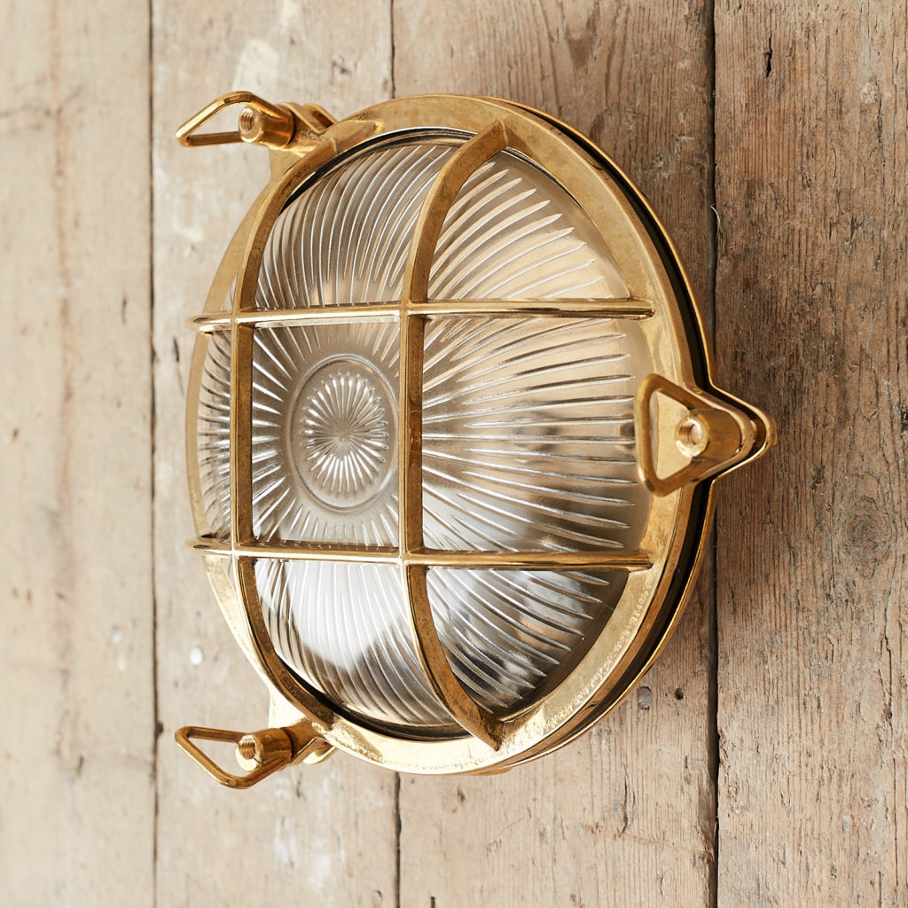 A round polished brass bulkhead light,-121576