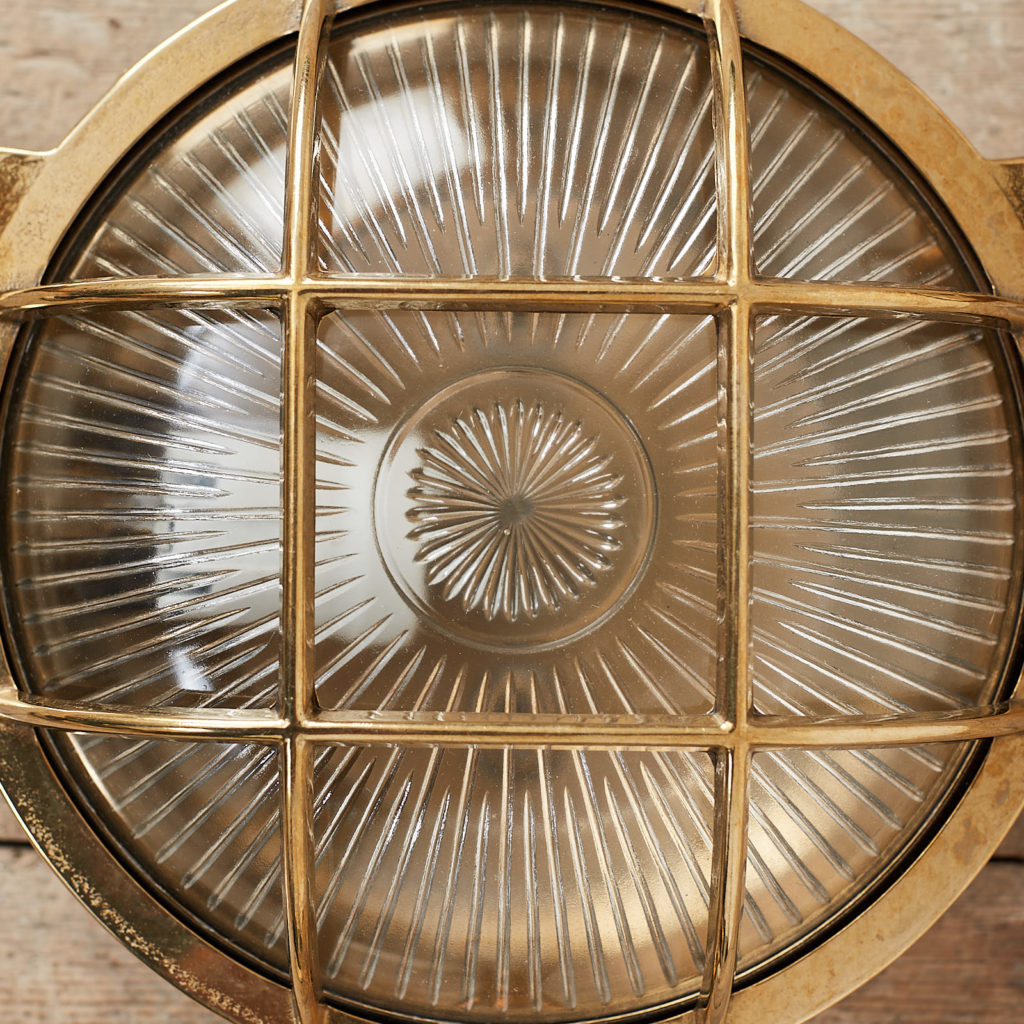 A round polished brass bulkhead light,-121577