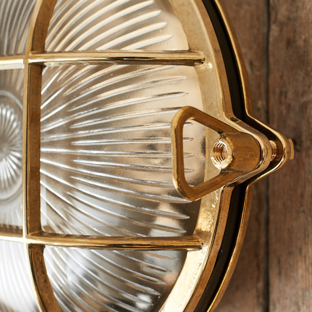 A round polished brass bulkhead light,-121580