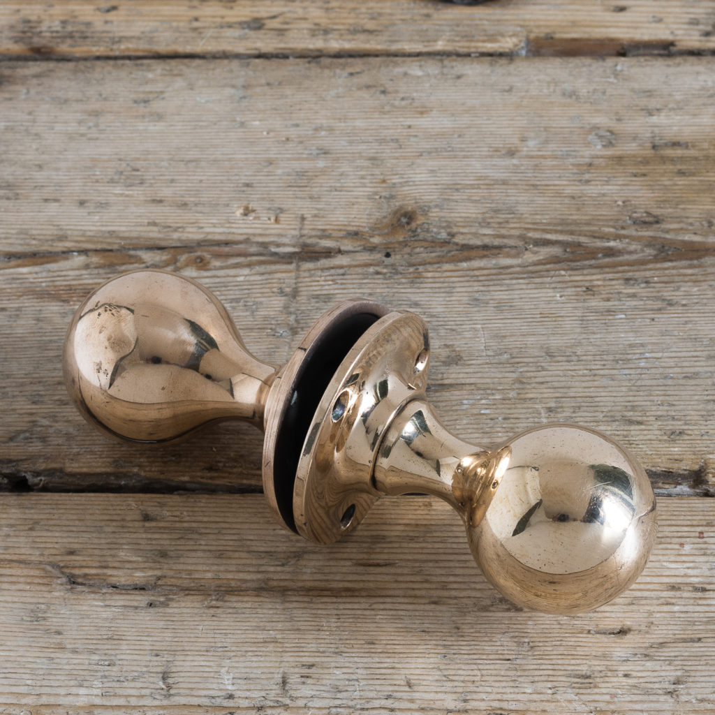 Early twentieth century rose brass door knobs,-122357