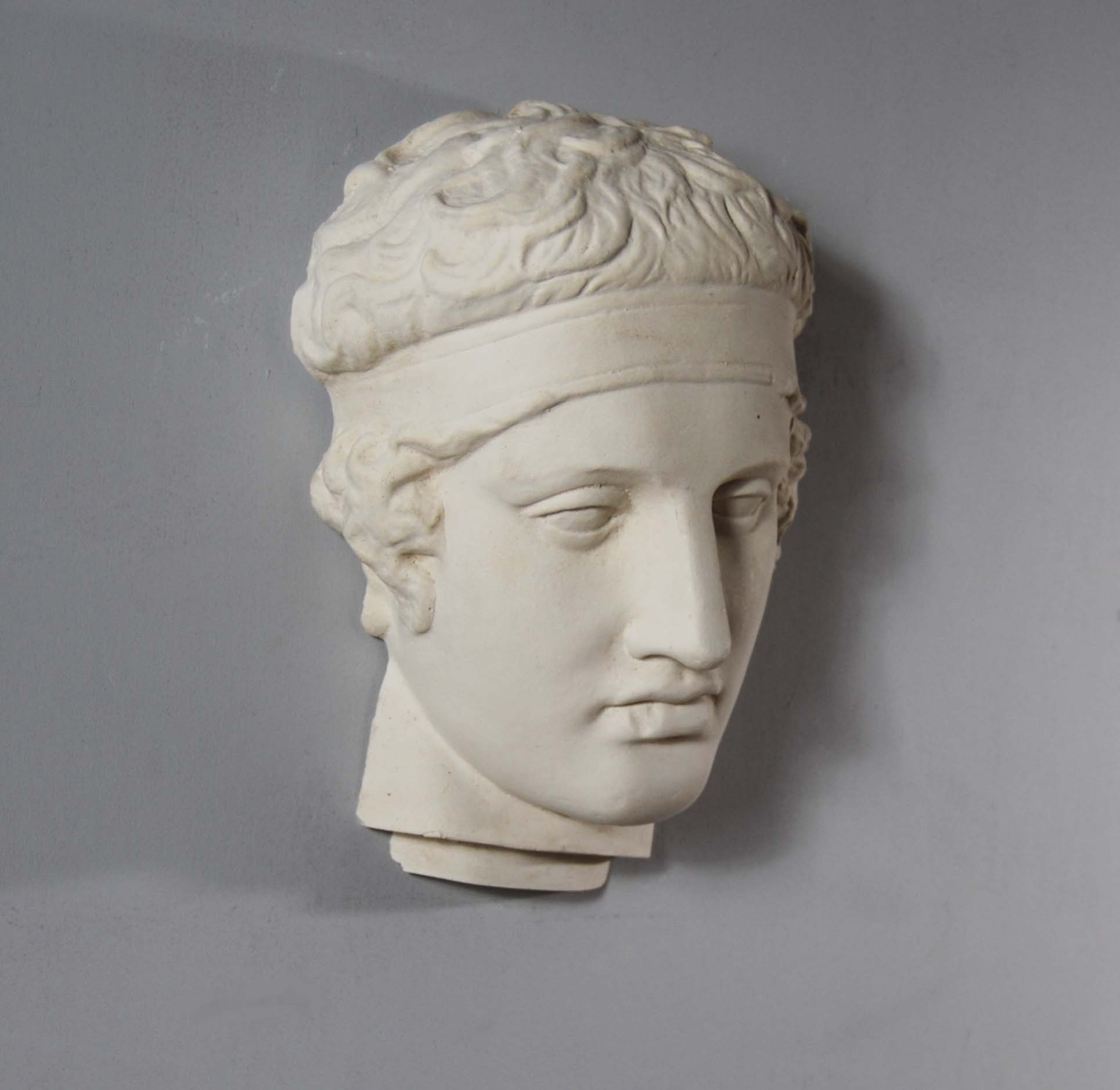 A plaster mask of an athlete-122936